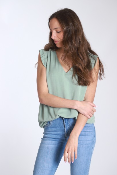 Blusa cuello pico y volante...