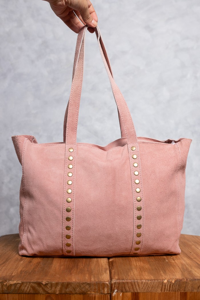 Bolso de tachuelas rosa