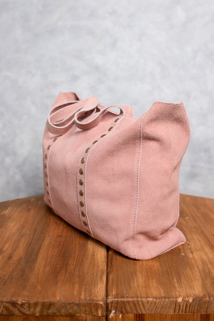 Bolso de tachuelas rosa