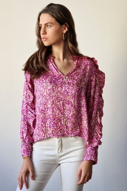 Blusa rosa con volante en...