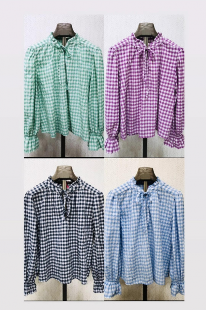 Blusa vichy con volante en...