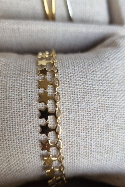 Pulsera de acero y estrellas