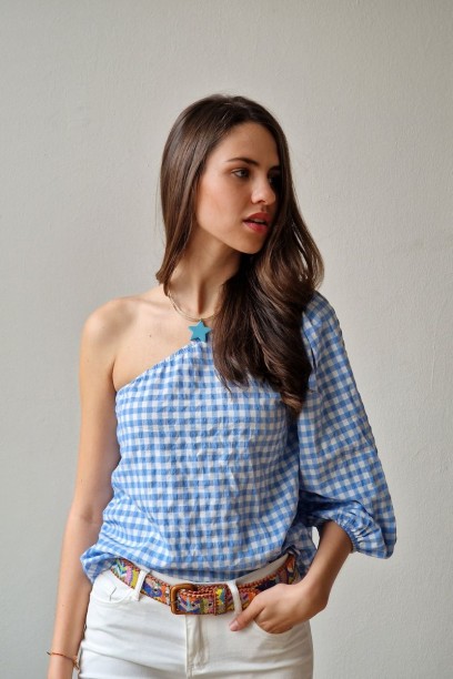 Blusa asimétrica cuadros...