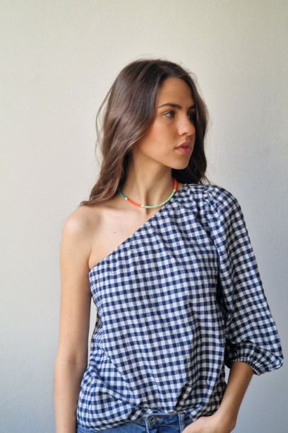 Blusa asimétrica cuadros...