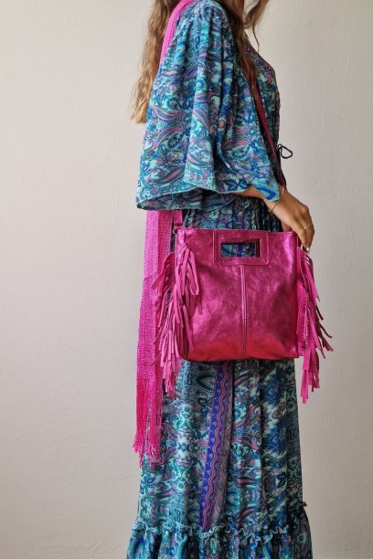 Bolso de piel con flecos...