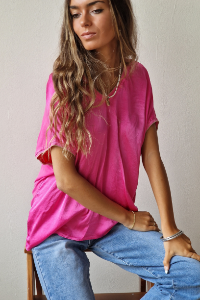 Camiseta rosa de manga...