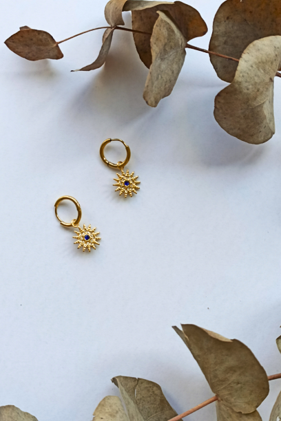 Pendientes con forma de sol...