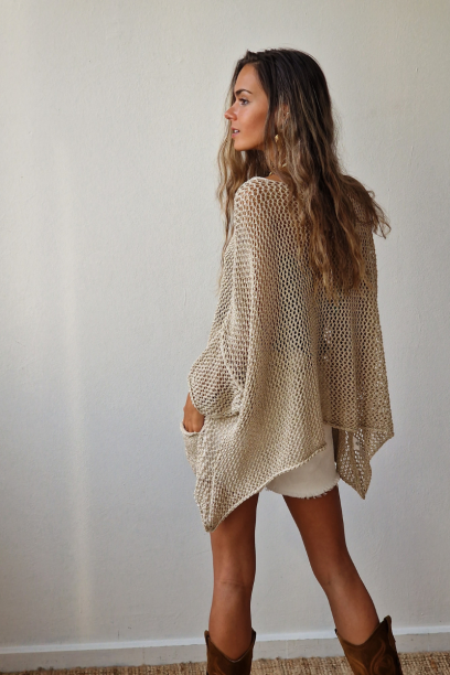 Jersey dorado oversize con...