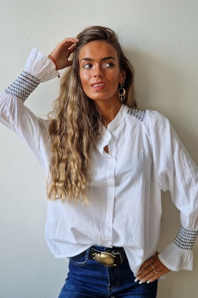 Camisa Blanca con volante...
