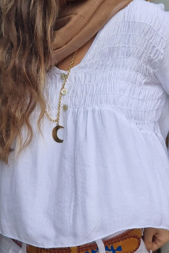Blusa de mujer con tela de puntitos blanca