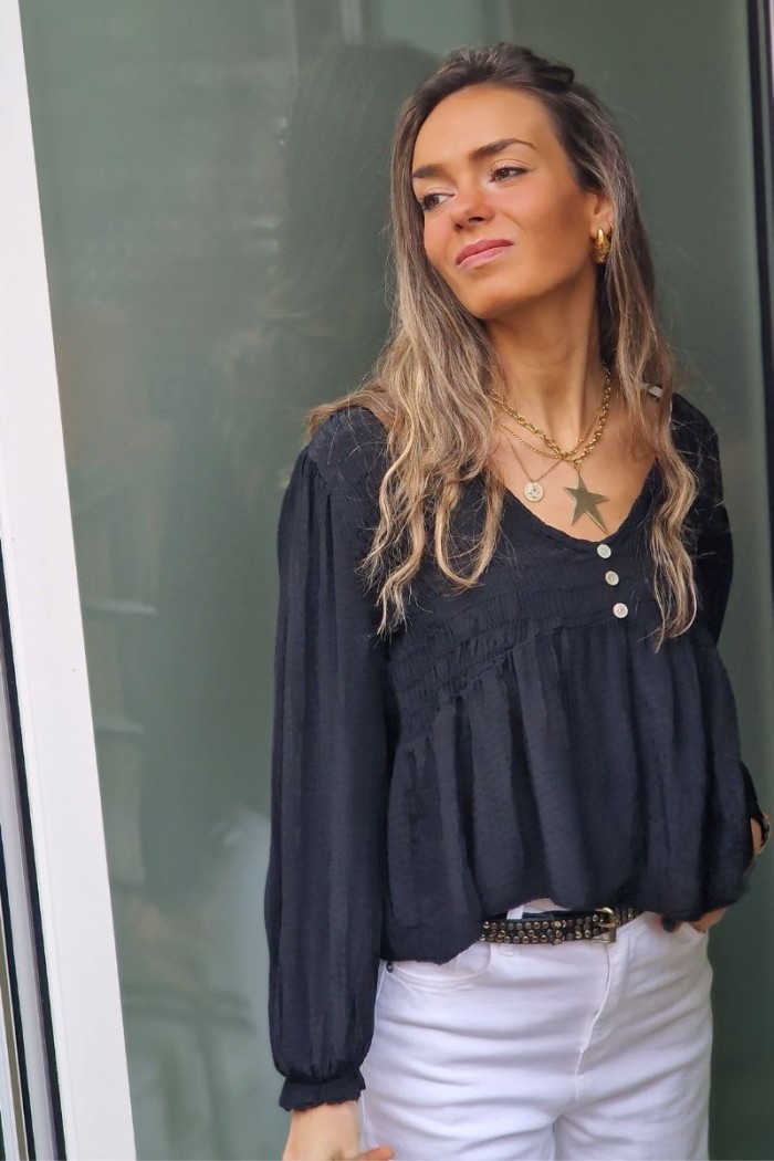 Blusa de mujer con tela de puntitos negra