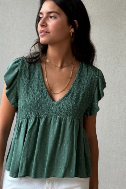 Blusa cuello pico con...