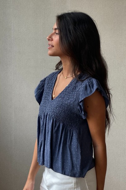 Blusa cuello pico con...
