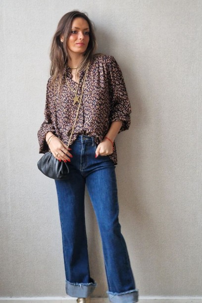 Blusa estampada con volante...