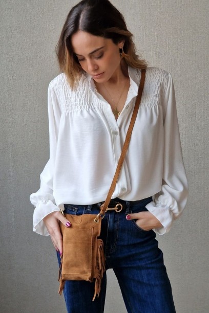 Bolso mini de ante y flecos...