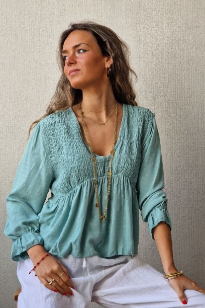 Blusa cuello pico con...