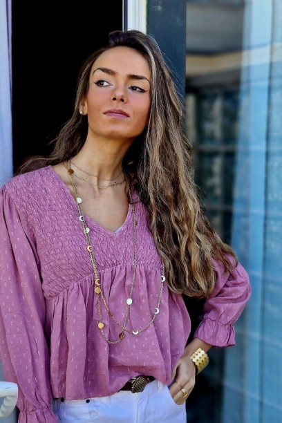 Blusa cuello pico de rayas...